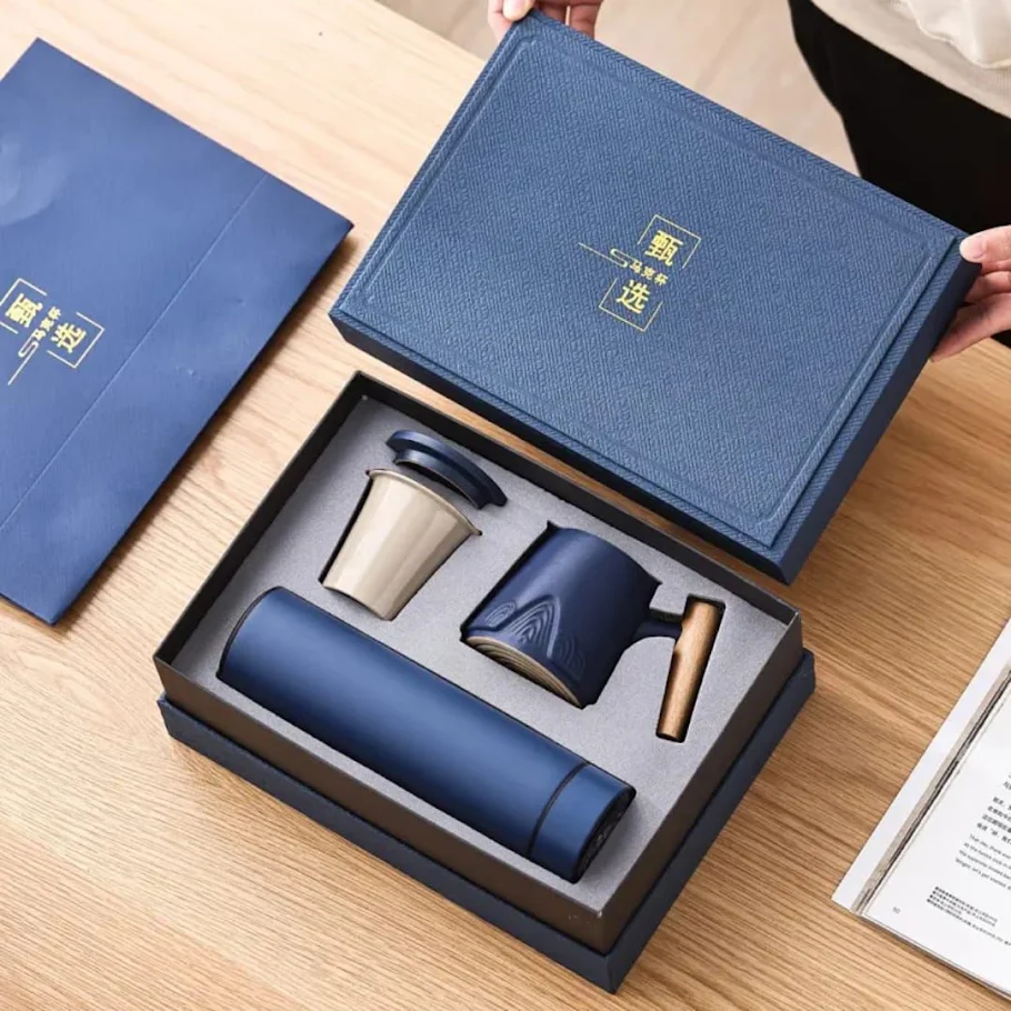 Blue premium tea gift box with ceramic mug, infuser and flask